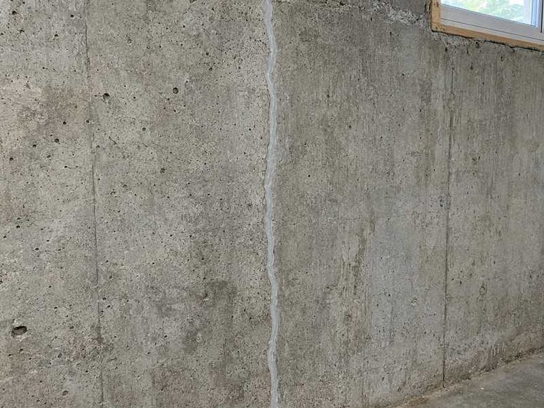 Sealed and reinforced foundation crack on an Asheville home